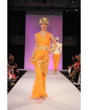 Bright orange jumper with akshar embroidery & texture
