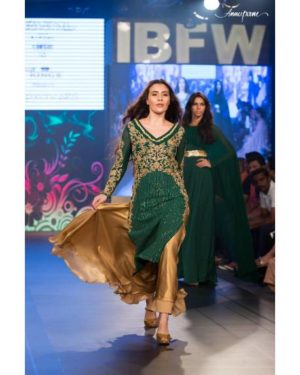 Green hand embroidered georgette kurta with golden silk satin palazzo