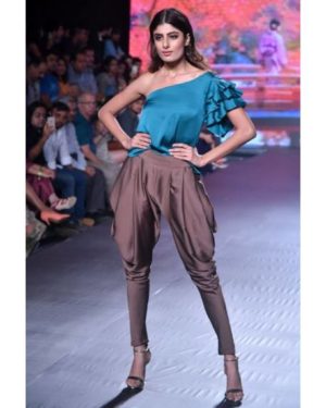 Peacock green one shoulder satin silk top with brown dhoti trousers