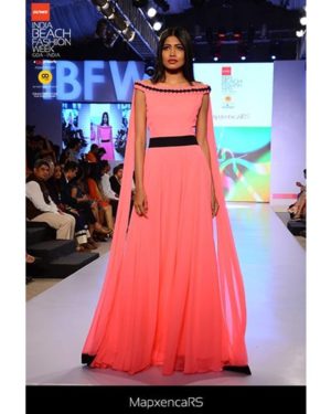 Pop pink georgette gown with texture insert on neckline & cape