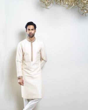 Offwhite all over embroidered kurta with zardosi embroidery and offwhite churidar
