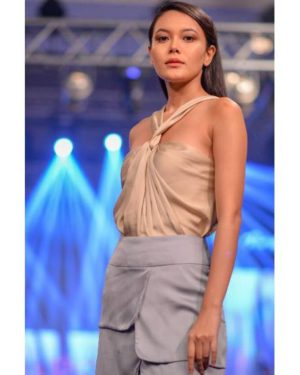 Beige satin silk knitted top and still grey skirt with square layers
